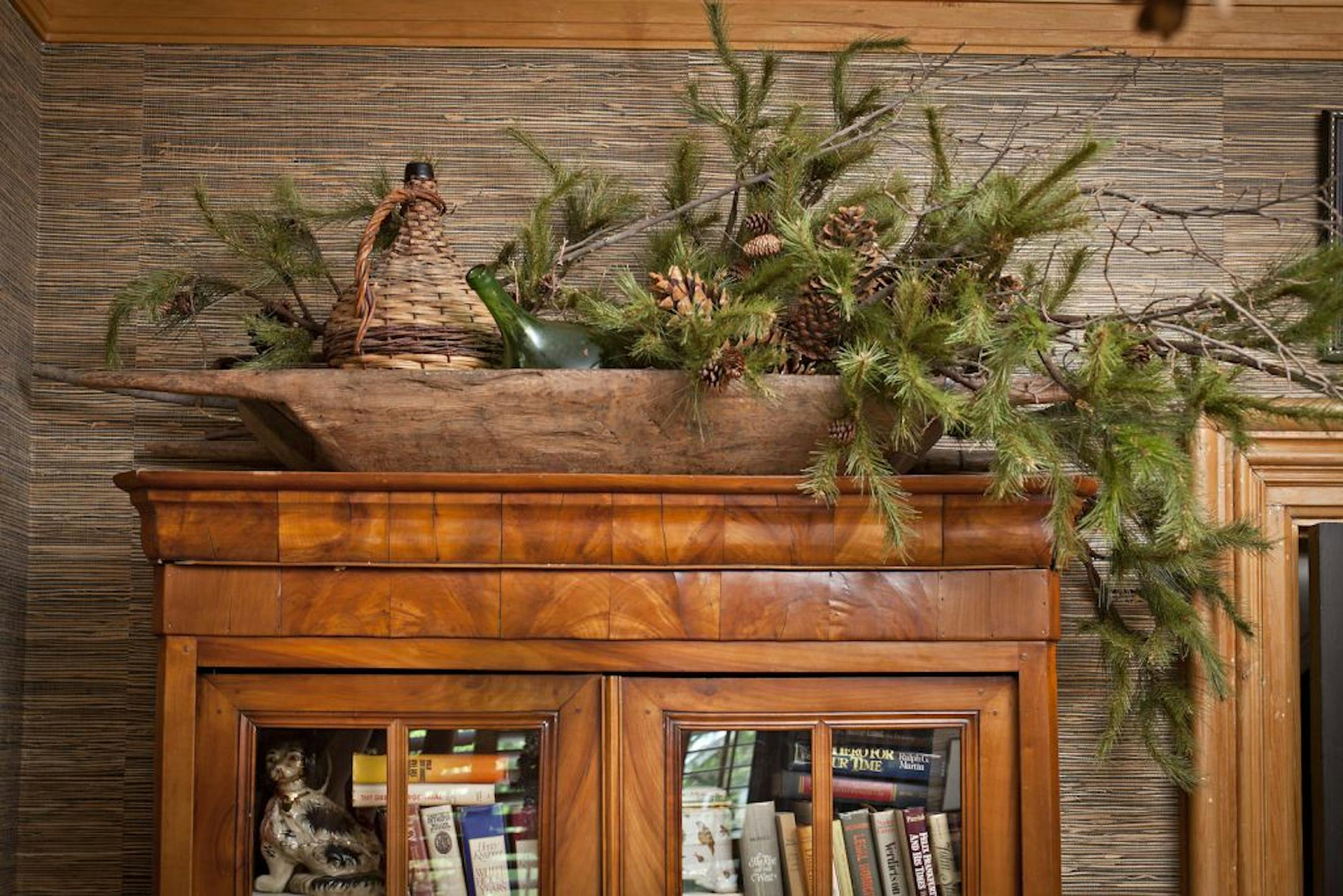 Think beyond the mantel and door for greenery.