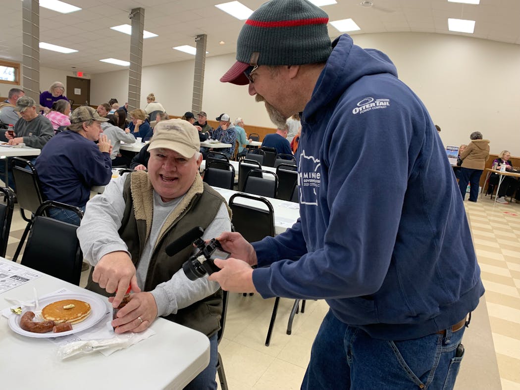 At the Vergas Event Center, Erik Osberg asked a breakfast attendee if he could shoot video footage of pouring syrup on his pancakes during the town’s annual Maple Syrup Fest.