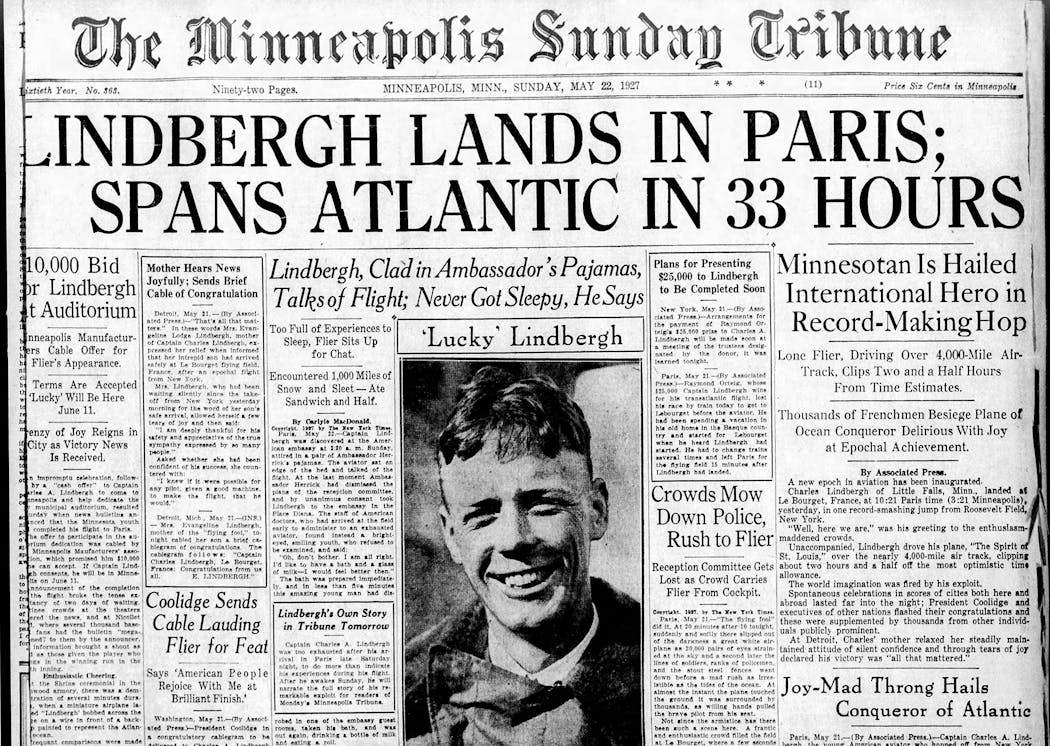 The front page of the Minneapolis Sunday Tribune trumpets Lindbergh's record-breaking trip.