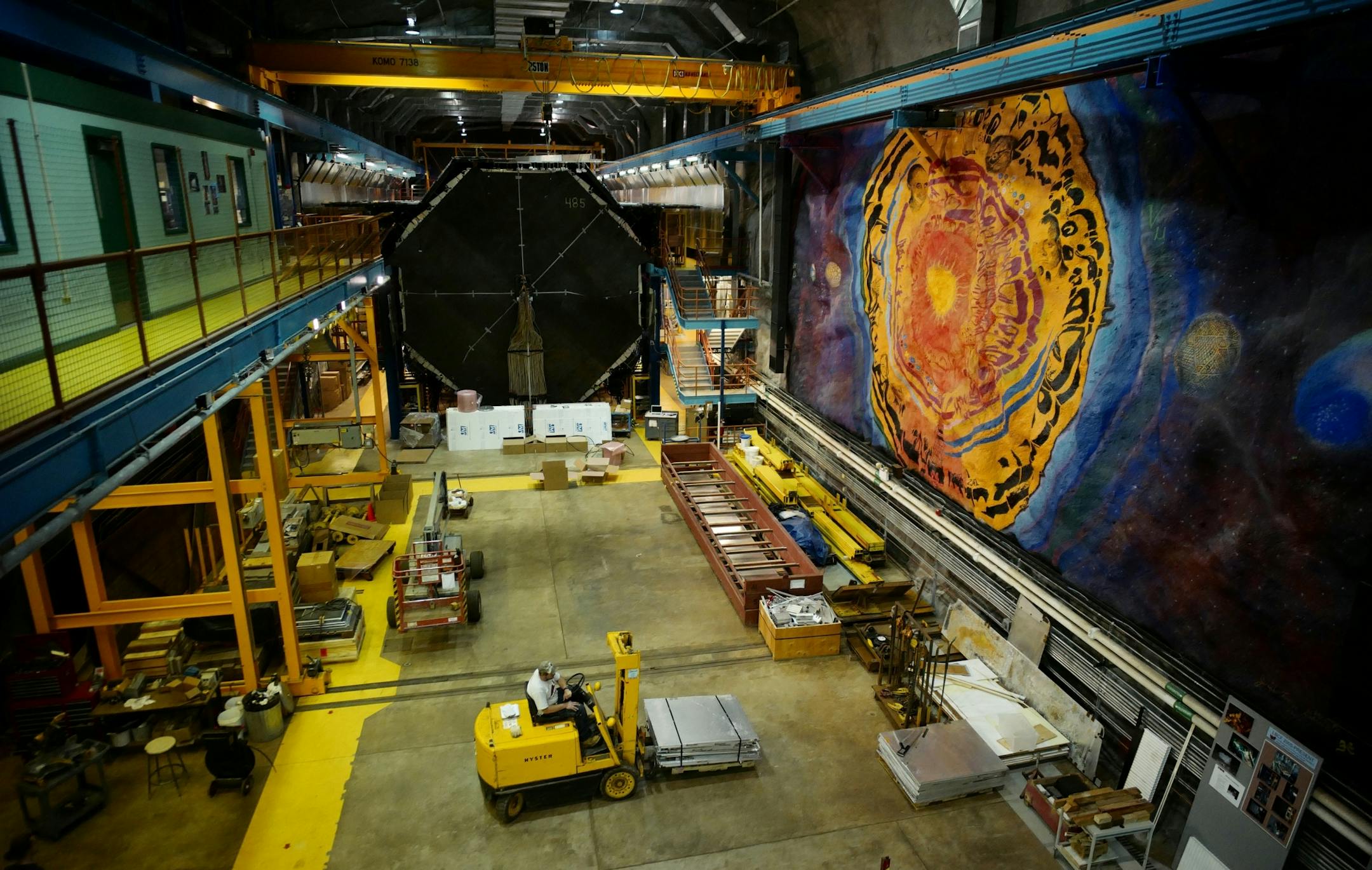 The Sudan Underground Laboratory features a 25 feet by 60 feet mural by artist Joseph Giannetti which celebrates physics research , the beauty of the universe, and the history of Sudan Mine.