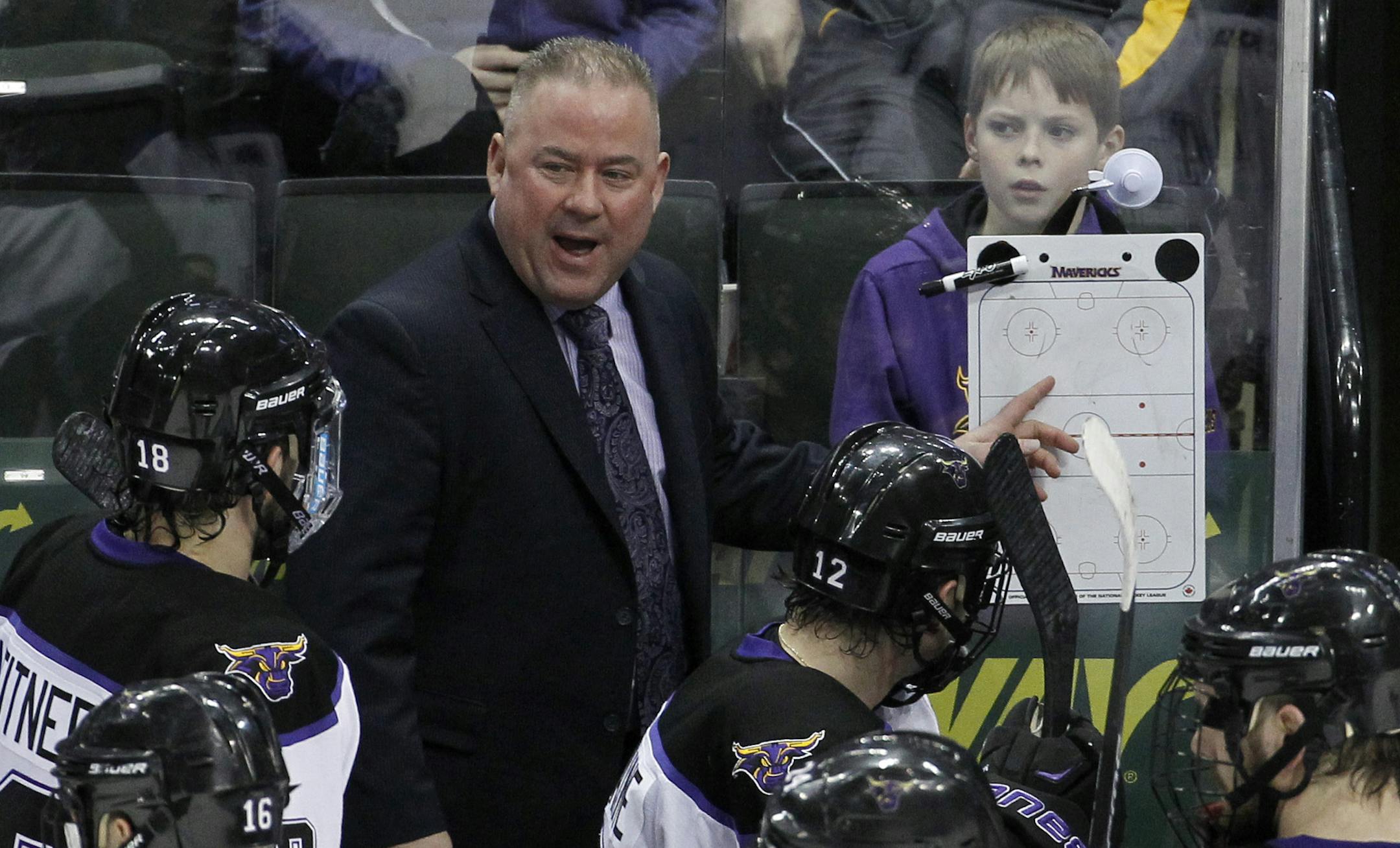 Minnesota State Mankato head coach Mike Hastings talks with his players during the third period of the WCHA Final Five college championship hockey game against Michigan Tech in St. Paul, Minn., Saturday, March 21, 2015. Minnesota State Mankato won 5-2. (AP Photo/Ann Heisenfelt) ORG XMIT: MNAH122 ORG XMIT: MIN1511121743450151 ORG XMIT: MIN1802132251381698