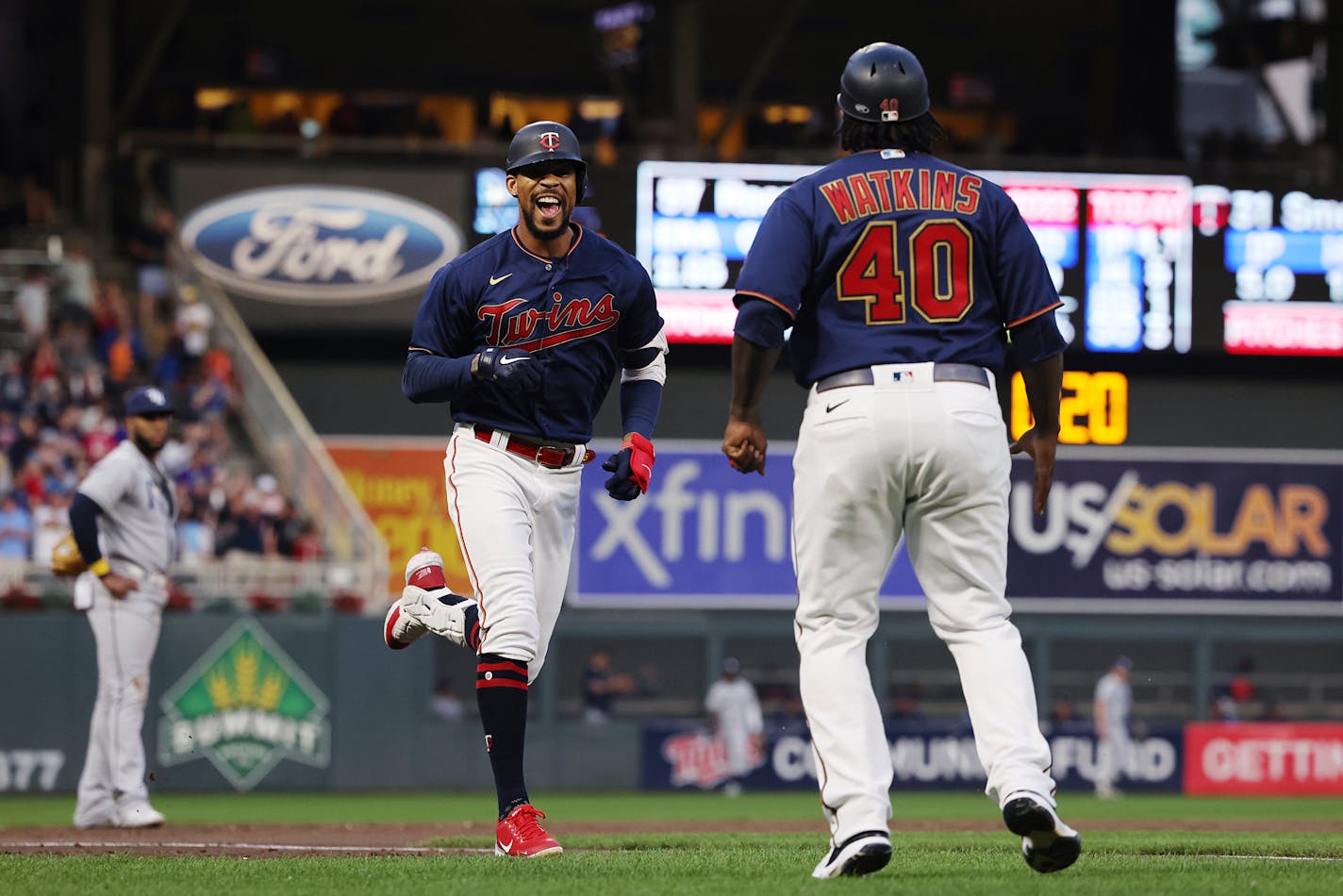 Byron Buxton smiled on his way to home plate after hitting his second home run of the night against the Tampa Bay Rays.