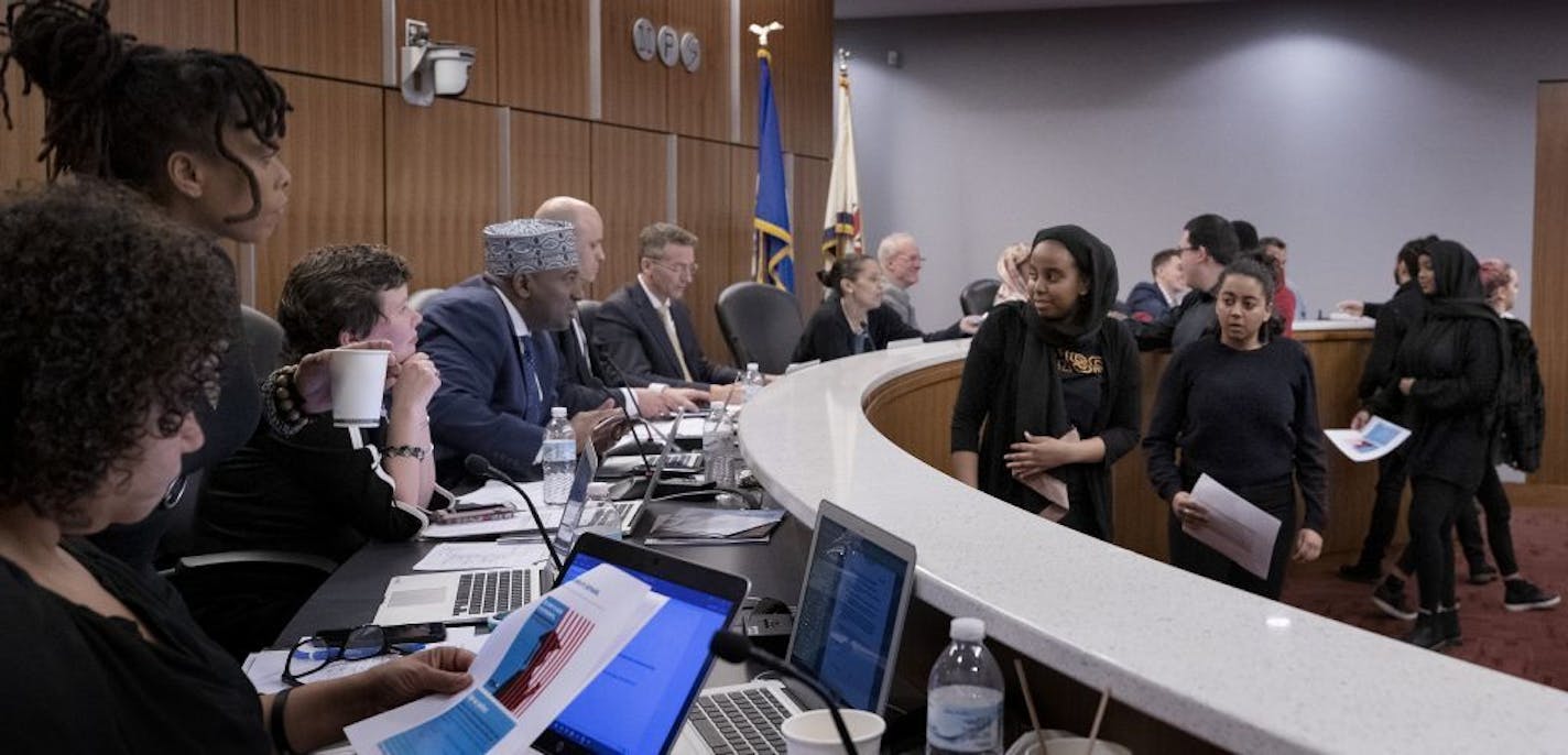 The Minneapolis school board, shown in 2019, heard about changes made to the district's proposed high school boundaries under a new plan to redesign the district's schools.