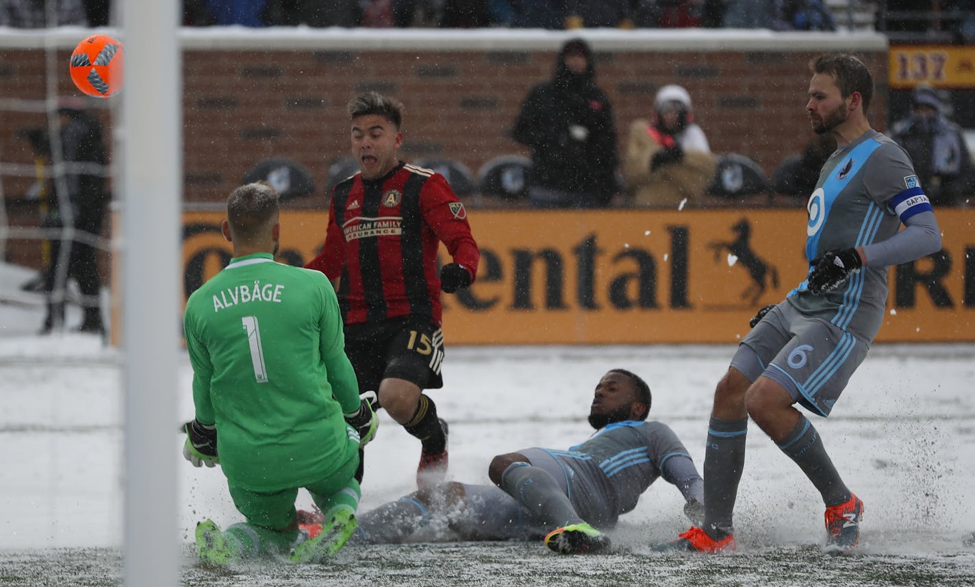 Atlanta United forward Hector Villalba (15) hurried a shot off while Minnesota United defender Jermaine Taylor (4) defended and Minnesota United goalkeeper John Alvbage (1) prepared to make a stop in the second half. Alvbage was injured in the ensuring collision and left the game. ] JEFF WHEELER &#xef; jeff.wheeler@startribune.com The MN United FC lost 6-1 to Atlanta United FC in their home opener Sunday afternoon, March 12, 2017 at TCF Bank Stadium in Minneapolis.