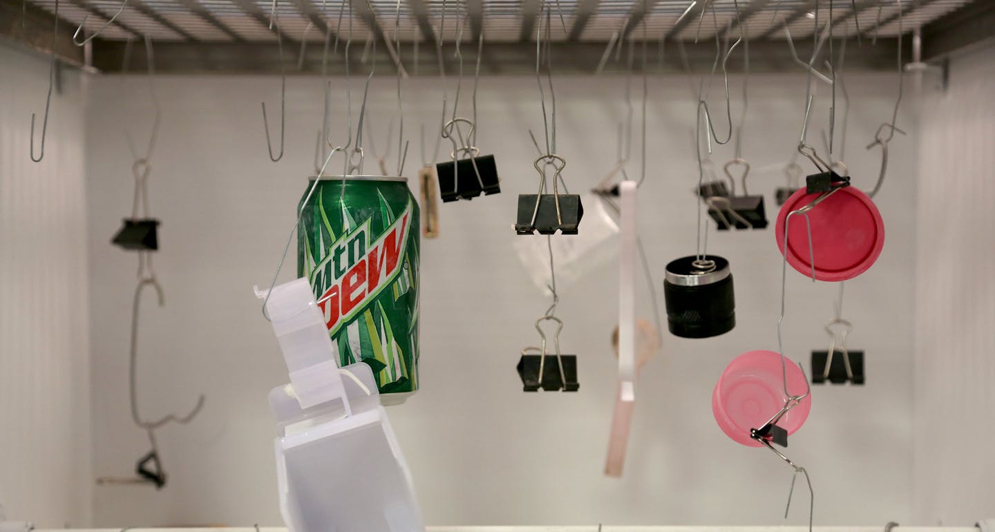 These items are in a closet where super glue is evaporated to make finger prints visible. ] (KYNDELL HARKNESS/STAR TRIBUNE) kyndell.harkness@startribune.com The crime lab at the Anoka County Sheriff's office in Andover , Min., Tuesday August 25, 2015.