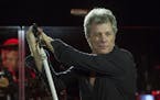 FILE - This Dec. 3, 2016 file photo shows Jon Bon Jovi performing with his band during Art Basel in Miami Beach, Fla. The band is holding a contest to