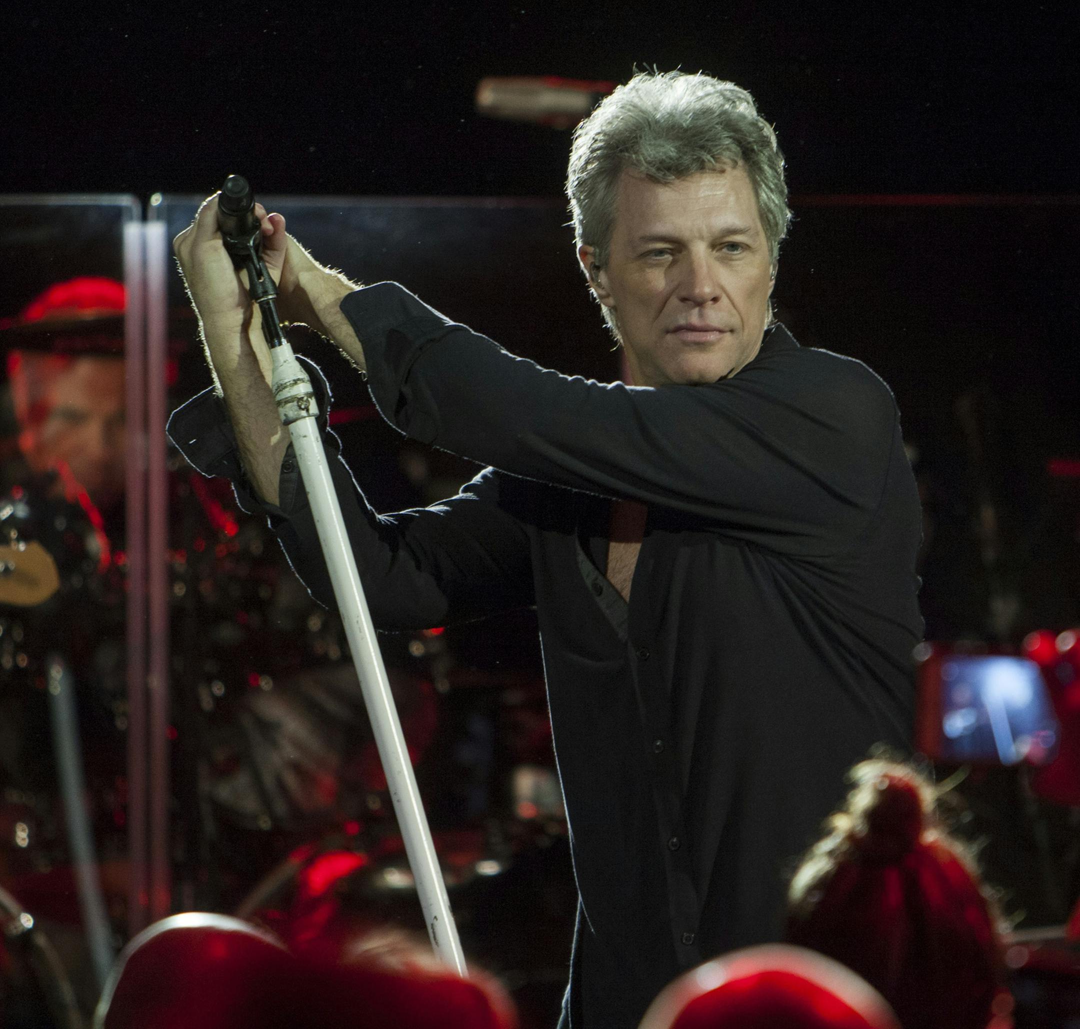 FILE - This Dec. 3, 2016 file photo shows Jon Bon Jovi performing with his band during Art Basel in Miami Beach, Fla. The band is holding a contest to choose bands or singers to open for their upcoming tour. Artists will upload videos of themselves performing original music, and concert promoters Live Nation will select 10 finalists. Bon Jovi management will then pick winners from the finalists to perform 20-minute sets. (Photo by Jesus Aranguren/Invision/AP, File)