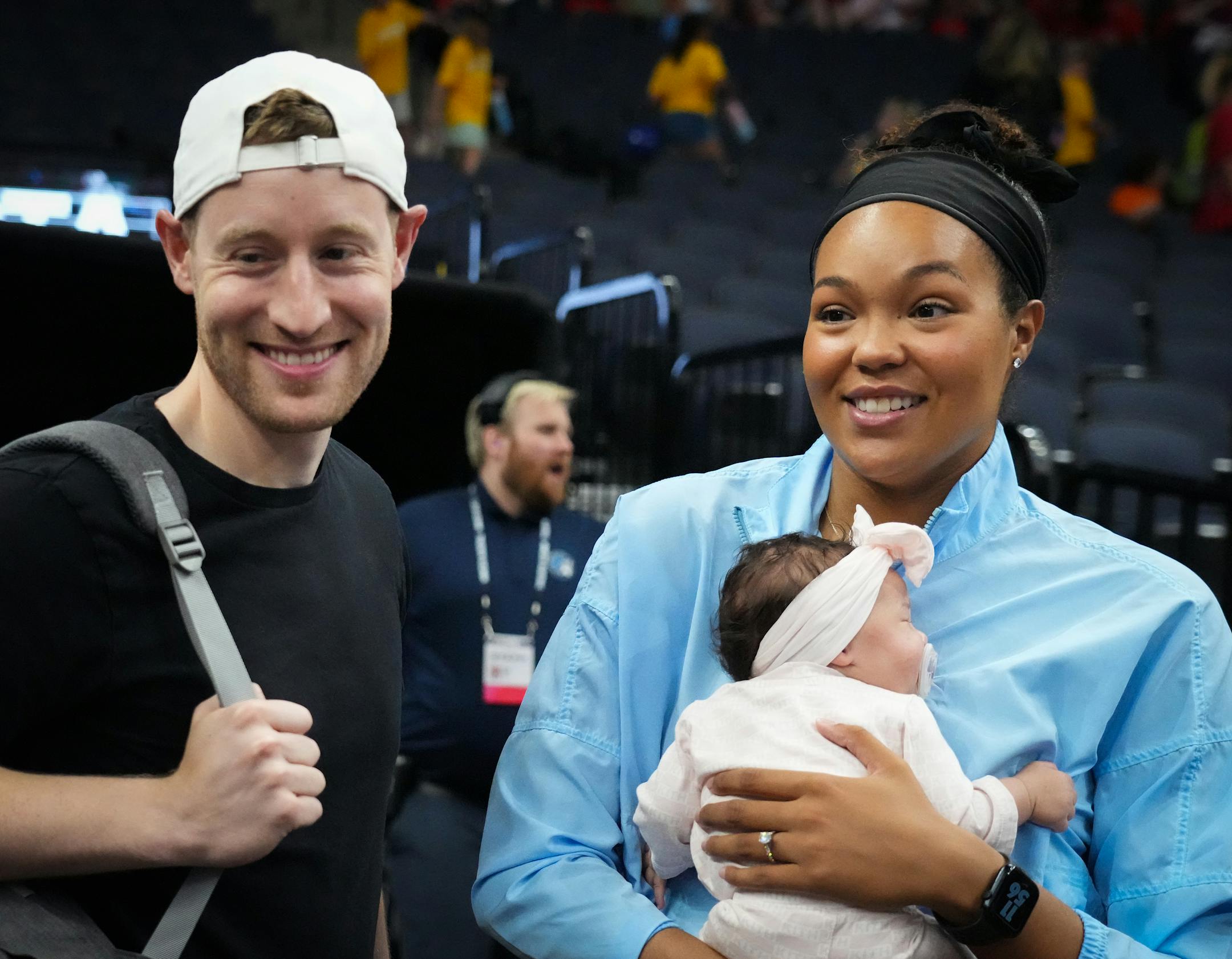 Lynx forward Napheesa Collier and husband Alex Bazzell are special guests at the game. Collier has been out this season on maternity leave.
