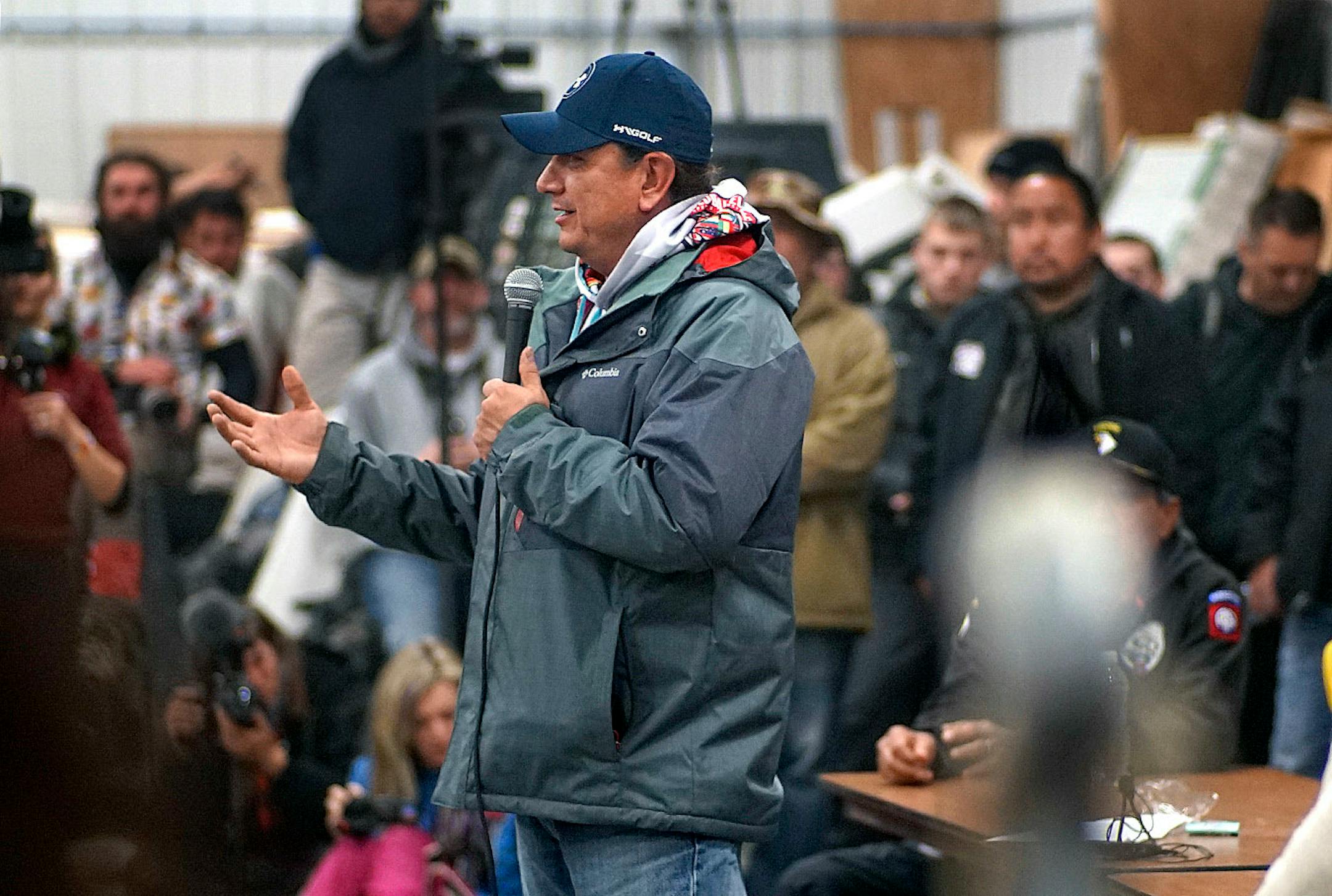 Standing Rock Reservation Chairman Dave Archambault addressed several hundred veterans at an orientation at Sitting Bull College in Fort Yates, N.D. They were cleansed with sage at the beginning of the three-hour proceedings and later instructed to be peaceful and nonviolent.