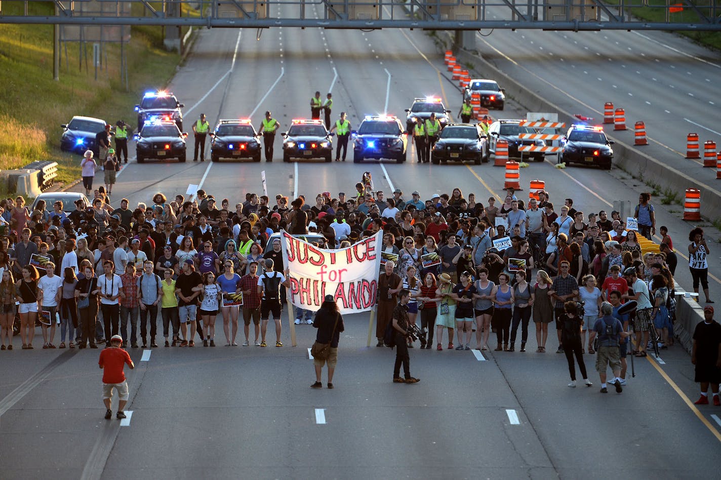 Marchers protesting the Wednesday night shooting death of Philando Castile by police have blocked part of Interstate 94 west of downtown St. Paul Saturday evening.