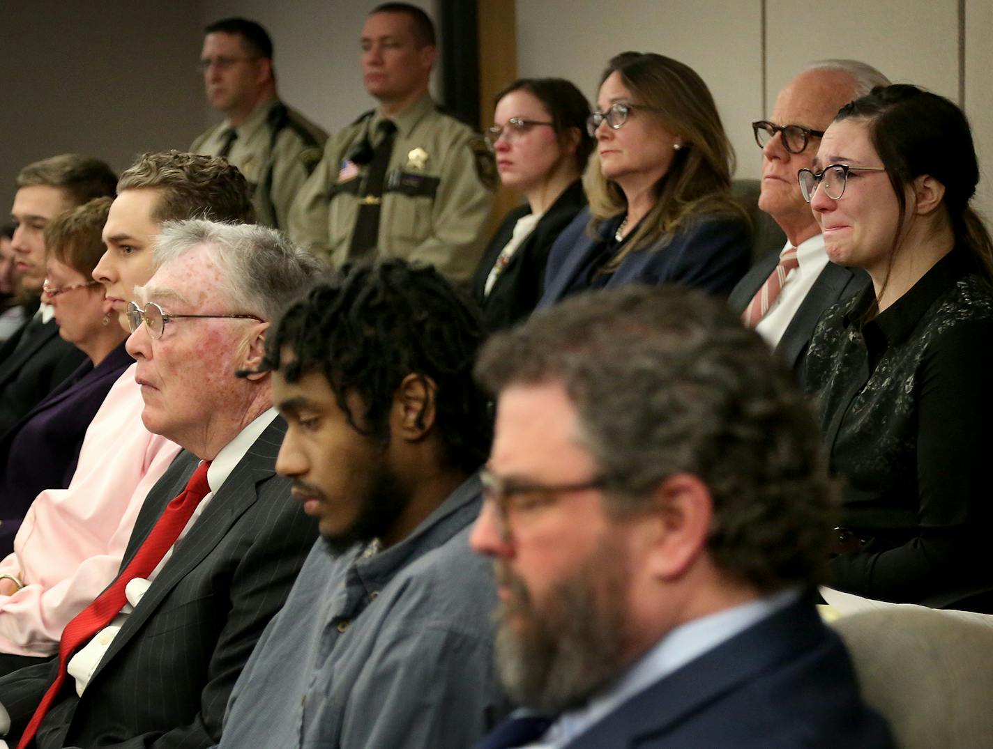 Five of six people involved in a robbery home invasion that resulted in one man being murdered were sentenced Friday, April 6, 2018, in Hennepin District courtroom of Judge Kerry W. Meyer in Minneapolis, MN. Here, five of the defendants in the case and their attorneys sit in court and listen to the victim impact statements.] DAVID JOLES &#xef; david.joles@startribune.com Five of six people involved in a robbery home invasion that resulted in one man being murdered are to be sentenced on Friday i