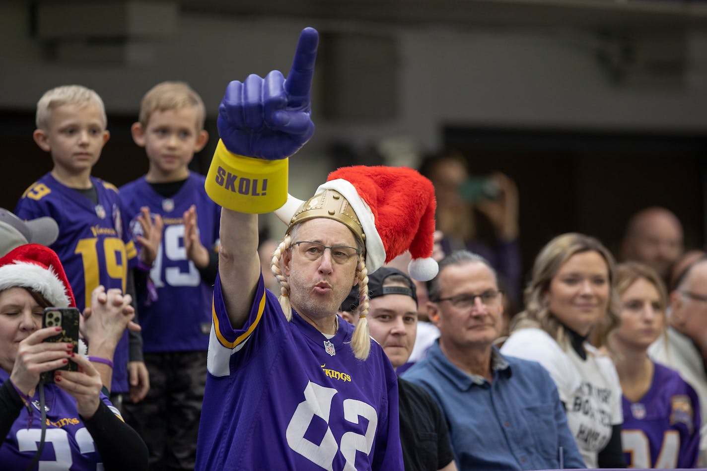 Tim Stepp of Lakeville, MN found a spot for his Santa hat as he cheered on the Vikings before the game, Sunday, Dec. 26, 2021 in Minneapolis, Minn. The Minnesota Vikings hosted the Los Angeles Rams at U.S. Bank Stadium. ] ELIZABETH FLORES • liz.flores@startribune.com