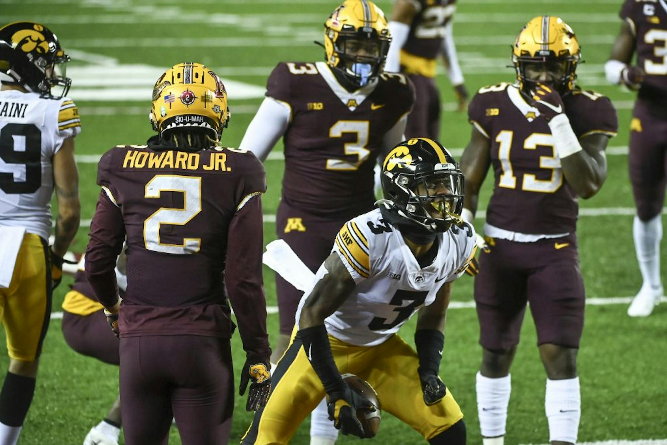 Iowa Hawkeyes wide receiver Tyrone Tracy Jr. (3) celebrated after rushing the ball to the 1-yard line, setting up a touchdown on the next play for Iowa against the Minnesota Gophers.