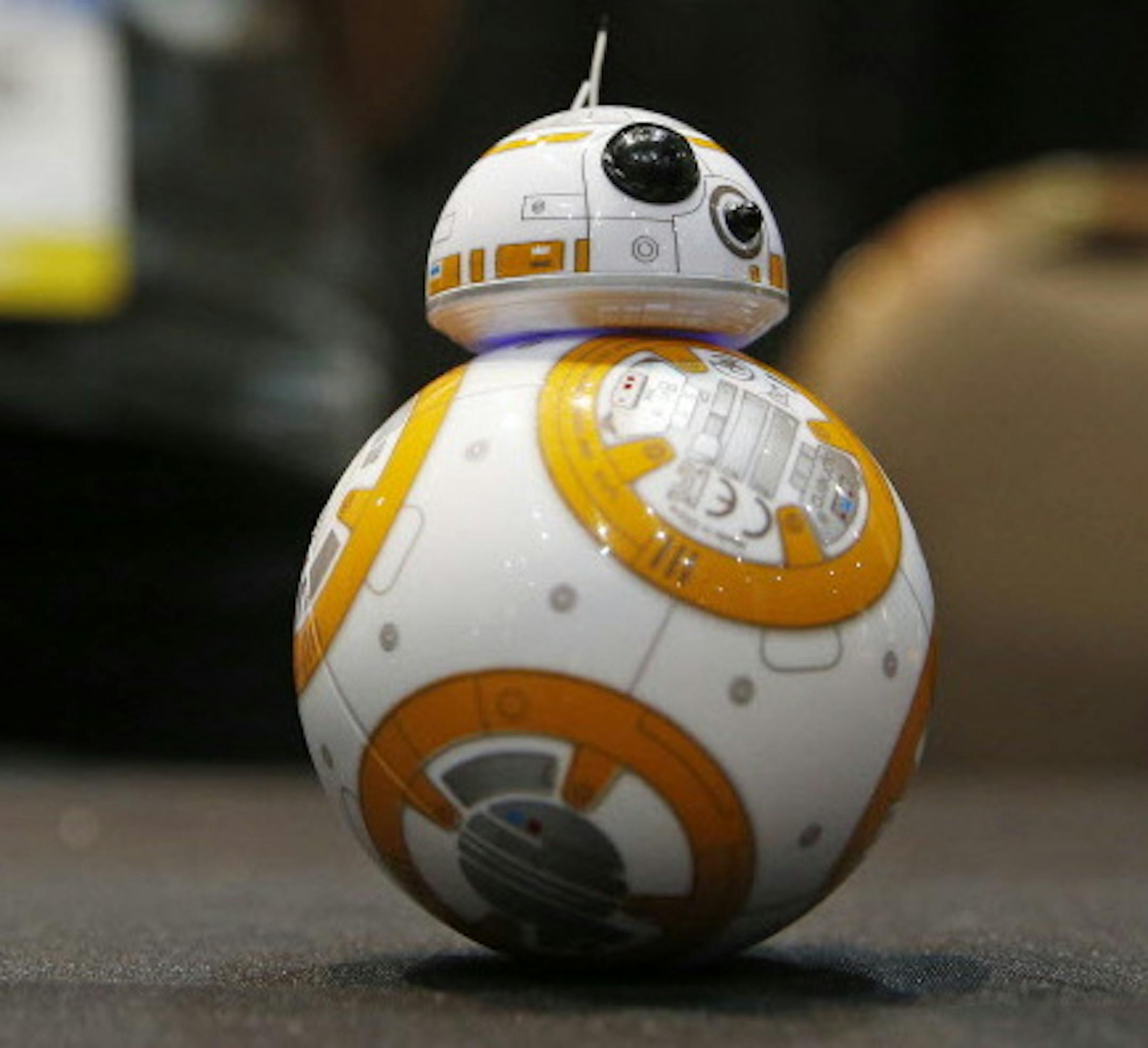 The Sphero BB-8 remote controlled droid is on display at CES Unveiled, a media preview event for CES International, Monday, Jan. 4, 2016, in Las Vegas. The robot is controlled by an app for a mobile device. (AP Photo/John Locher)