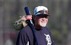 Detroit Tigers manager Ron Gardenhire walks onto the field at baseball spring training camp, Friday, Feb. 16, 2018, in Lakeland, Fla. (AP Photo/Lynne 