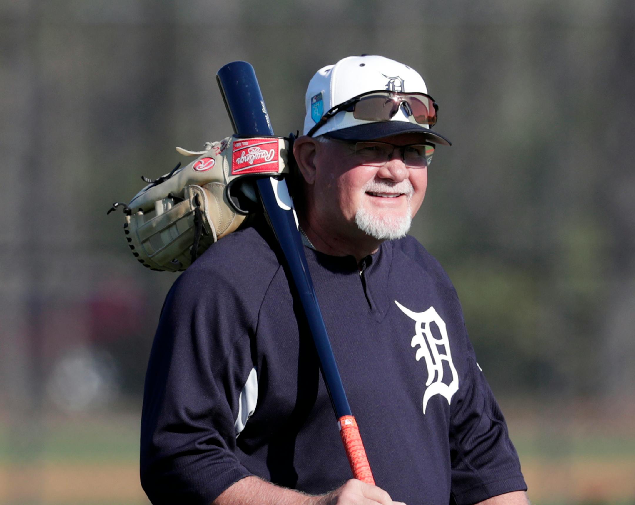 Detroit Tigers manager Ron Gardenhire walks onto the field at baseball spring training camp, Friday, Feb. 16, 2018, in Lakeland, Fla. (AP Photo/Lynne Sladky)