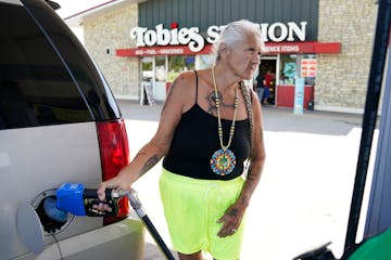 Julie Hernandez-Corado topped off her GMC Yukon at Tobies Station in Hinckley this week. “I don’t know how people live,” she said, referring to 