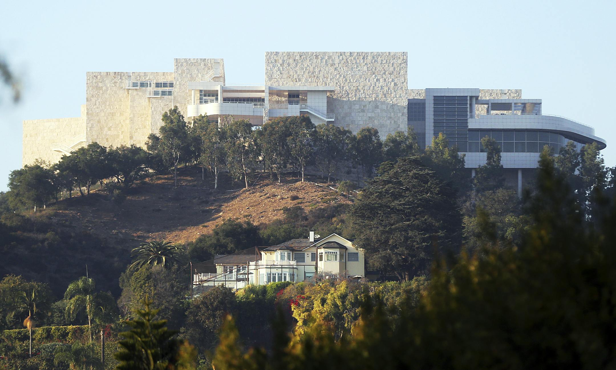 The Getty Center is seen after a wildfire swept through Los Angeles' Bel Air neighborhood Wednesday, Dec. 6, 2017. The Getty Center, the $1 billion home to the J. Paul Getty Museum and related organizations, stands on the west side of Sepulveda Pass. The fire did not immediately cross the wide expanse of the pass to the Getty side, but if it had, the facility is prepared. (AP Photo/Reed Saxon)