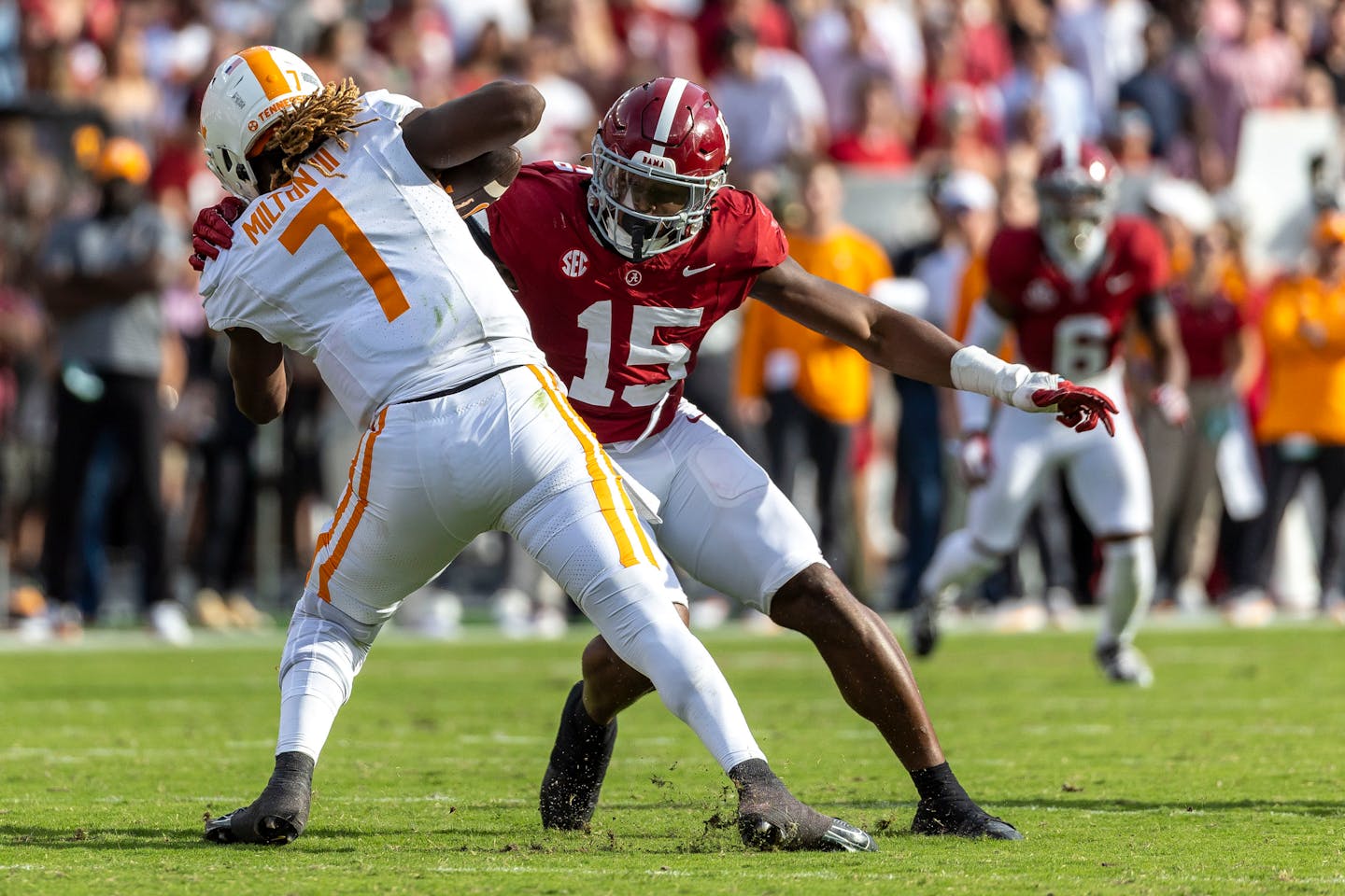 Alabama edge rusher Dallas Turner (15) pursues Tennessee quarterback Joe Milton III during a game last October. Turner recently starred at the NFL sco