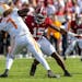 Alabama edge rusher Dallas Turner (15) pursues Tennessee quarterback Joe Milton III during a game last October. Turner recently starred at the NFL sco