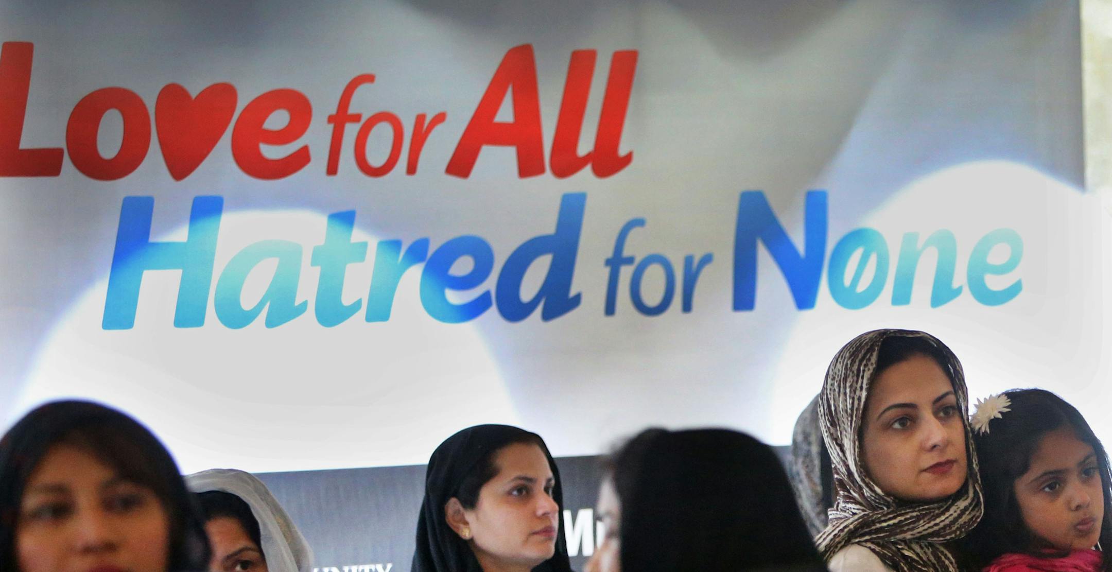 A banner reflecting the belief of the Ahmadiyya Muslim Community hung inside a tent during an inauguration Saturday, May 23, 2015, of Nusrat Mosque in Coon Rapids, the first and only mosque in Minnesota for the Ahmadiyya Muslim Community.](DAVID JOLES/STARTRIBUNE)djoles@startribune.com Community members are invited to attend the inauguration of Nusrat Mosque in Coon Rapids, the first and only mosque in Minnesota for the Ahmadiyya Muslim Community. USRep. Keith Ellison will give the keynote addre
