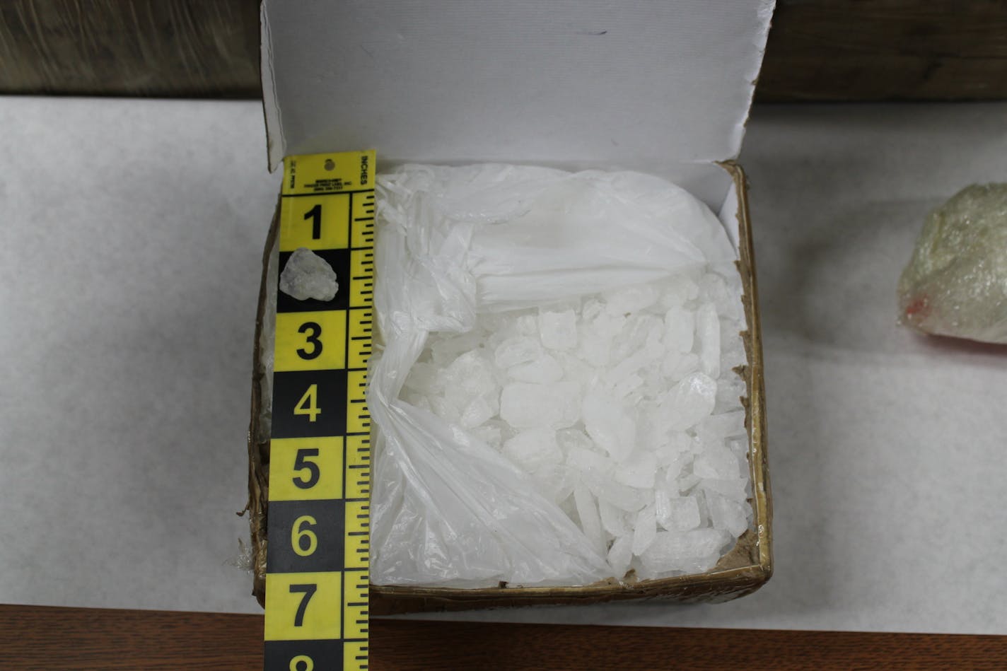 This photo provided by the Cannon River Drug and Violent Task Force shows a box containing methamphetamine. Authorities said Friday, Sept. 14, 2018 that task force agents assisted by a Minneapolis police SWAT team seized just under 171 pounds of meth with an estimated street value of $7.75 million on Tuesday, and arrested four suspects who've now been charged.