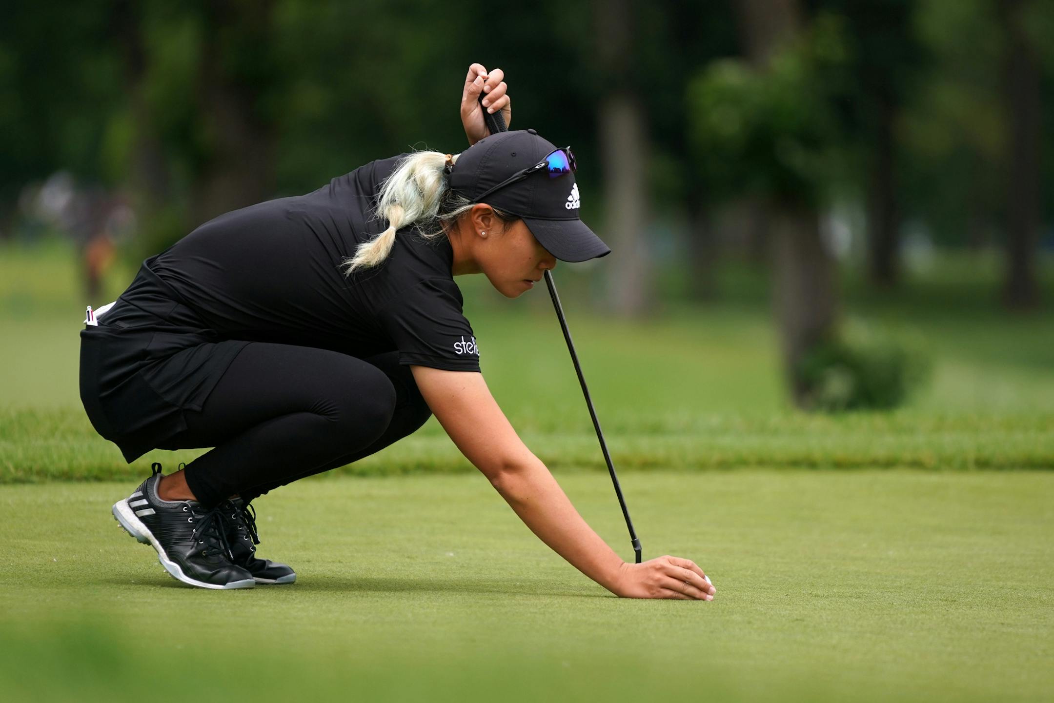 Danielle Kang lined up a putt on the 4th hole. ] ANTHONY SOUFFLE &#x2022; anthony.souffle@startribune.com Golfers took part in the second day of competition play during the KPMG Women's PGA Championship Tournament Friday, June 21, 2019 at Hazeltine National Golf Club in Chaska, Minn.