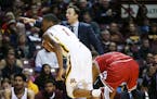 Gophers head coach Richard Pitino shouted directions for guard Dupree McBrayer (1) last month.