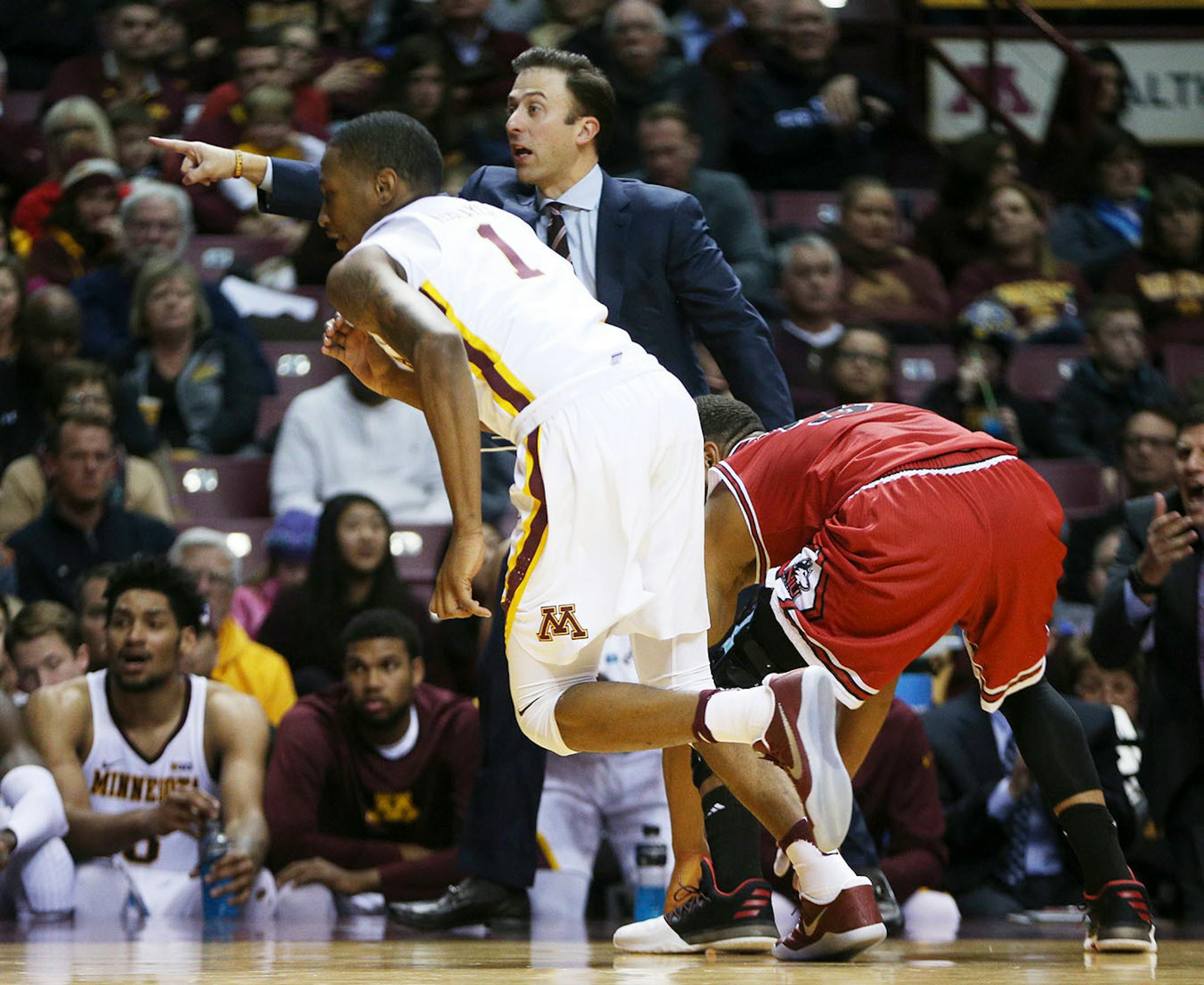 Gophers head coach Richard Pitino shouted directions for guard Dupree McBrayer (1) last month.