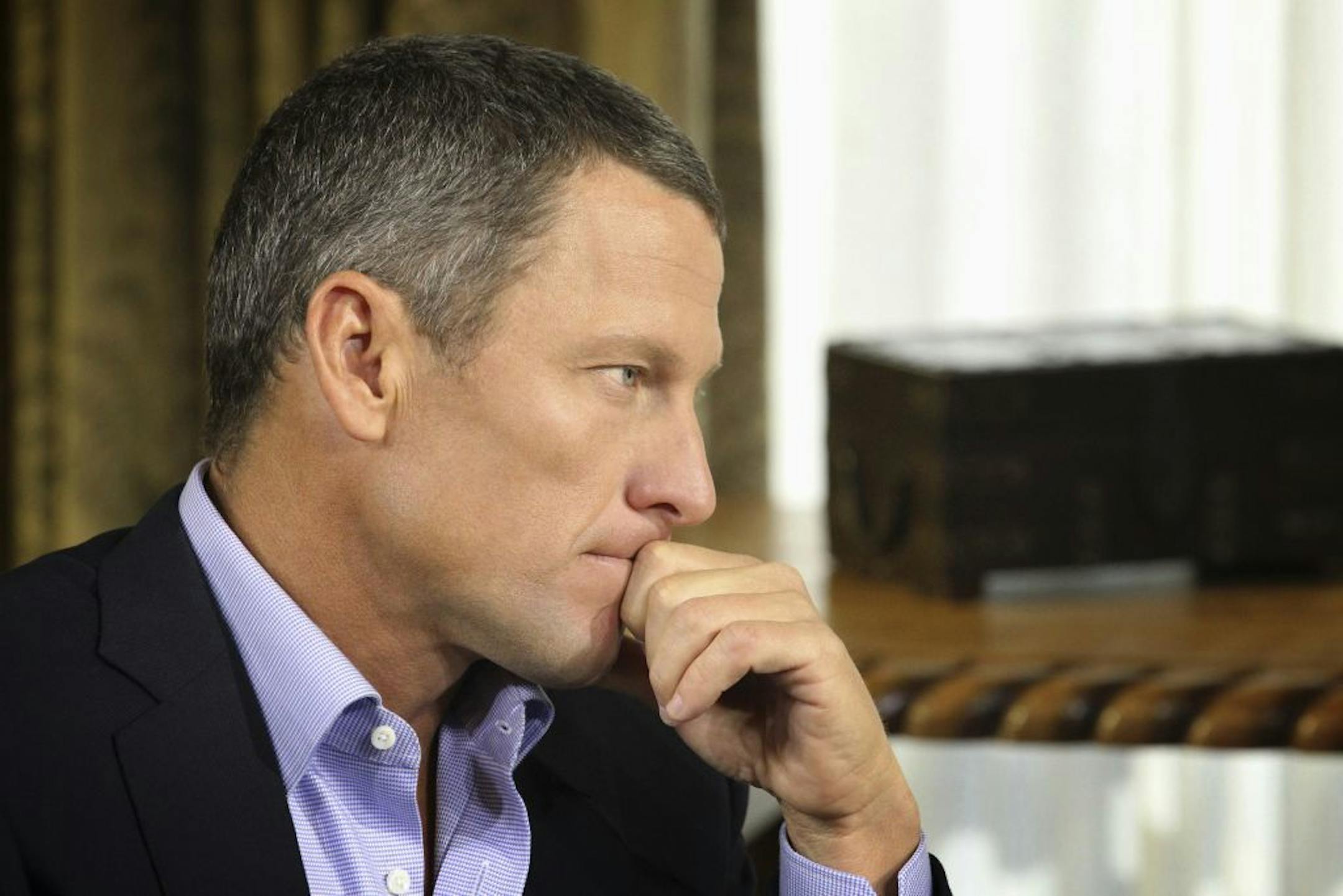 In this Monday, Jan. 14, 2013 photo provided by Harpo Studios Inc., cyclist Lance Armstrong listens to a question from Oprah Winfrey during taping for the show "Oprah and Lance Armstrong: The Worldwide Exclusive" in Austin, Texas.