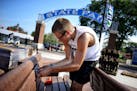 Lars Erickson inserted donor plaques into around 100 new State Fair Foundation benches for the new West End Market. The opening of the 2014 Minnesota 