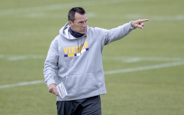 Vikings coach Mike Zimmer called Gary Kubiak, above, the "best thing" that's happened to him in Minnesota.
