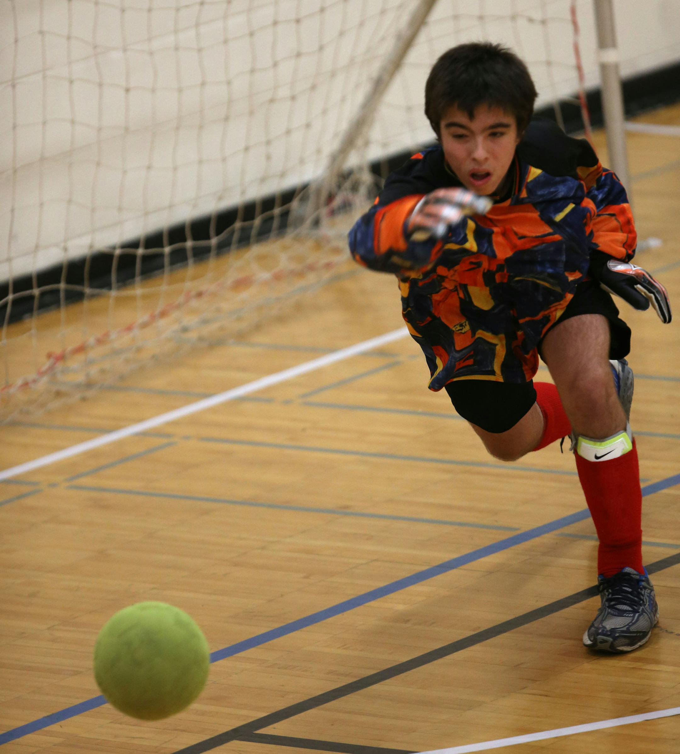 North Suburban's goalie Nick Reichenbacher after making a save threw the ball to a teammate. ] (KYNDELL HARKNESS/STAR TRIBUNE) kyndell.harkness@startribune.com Adapted soccer playoffs North Suburban vs Southern Stars at Centennial High School in Circle Pines , Min., Wednesday, November 5, 2014.