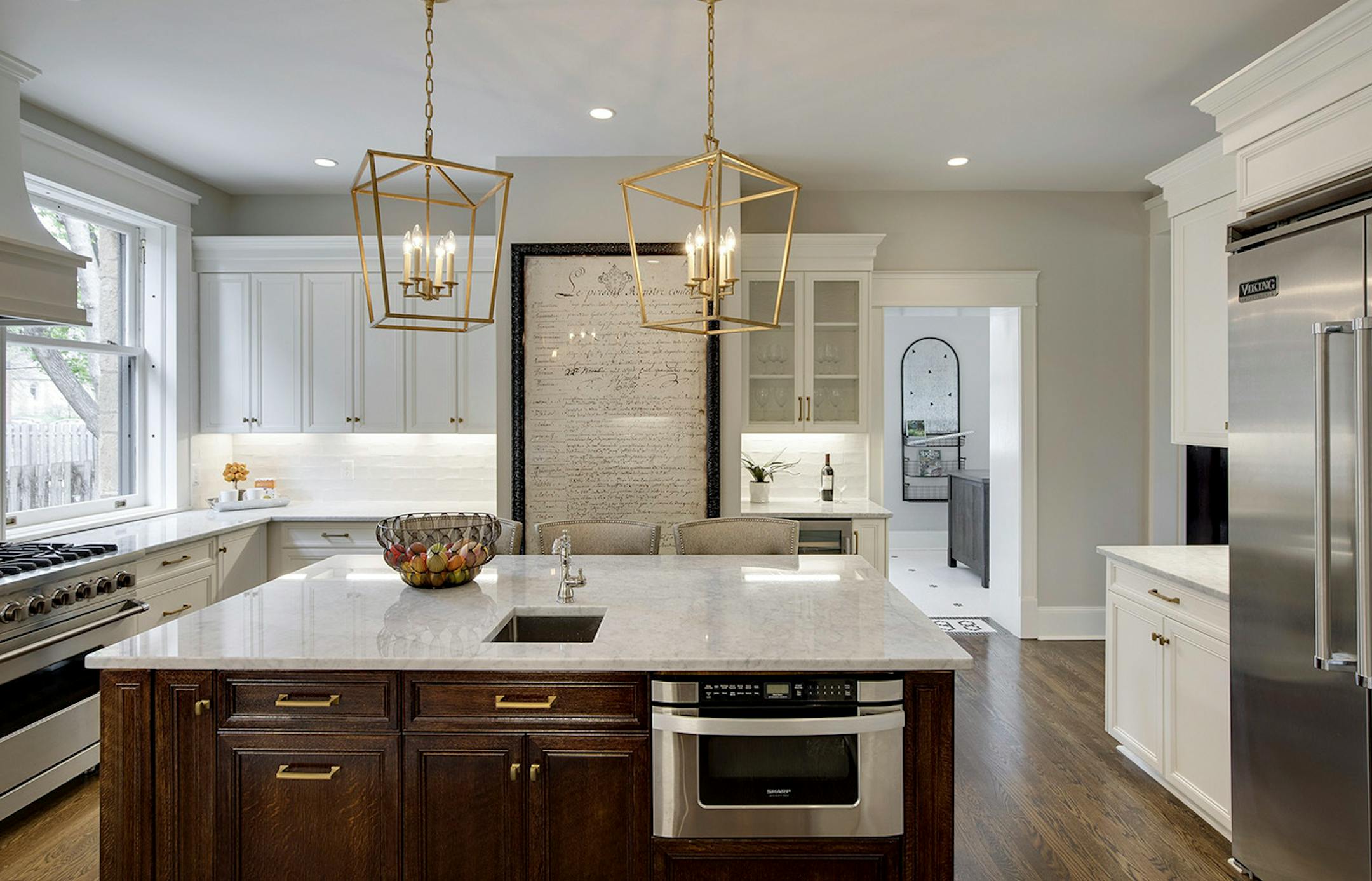 The home has a brand-new kitchen with marble countertops and a large center island.