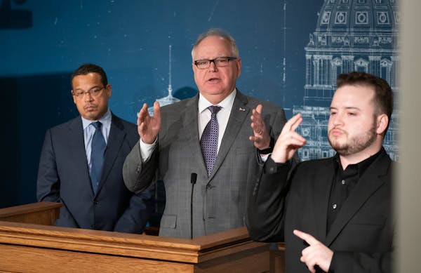 Gov. Tim Walz spoke Friday about community mitigation strategies for the COVID-19 pandemic, with Minnesota Health Commissioner Jan Malcolm and Attorne