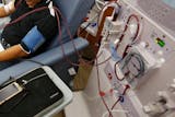 A patient undergoes dialysis at a clinic in Sacramento, Calif. Results of a study released on Sunday show that the diabetes drug Invokana has been shown to help prevent or delay worsening of kidney disease, which causes millions of deaths each year and requires hundreds of thousands of people to use dialysis to stay alive.