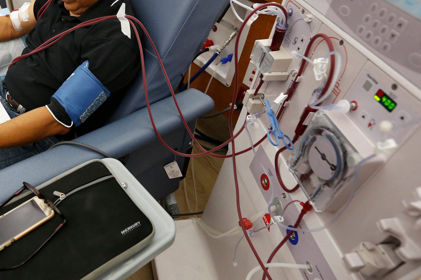 A patient undergoes dialysis at a clinic in Sacramento, Calif. Results of a study released on Sunday show that the diabetes drug Invokana has been shown to help prevent or delay worsening of kidney disease, which causes millions of deaths each year and requires hundreds of thousands of people to use dialysis to stay alive.