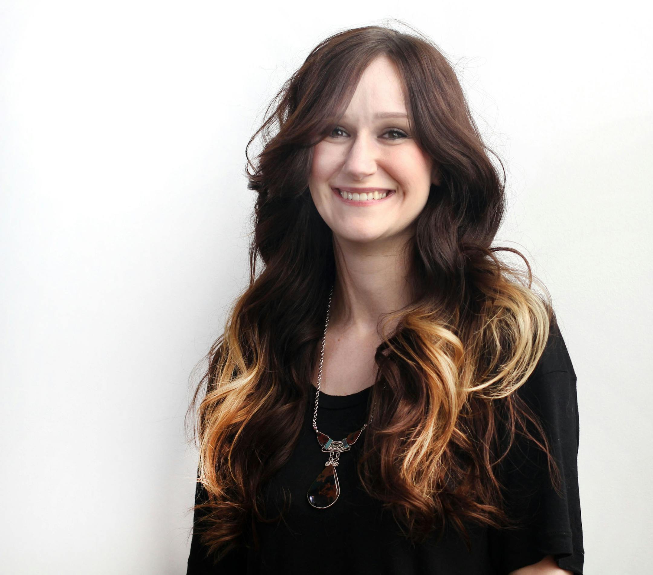 Katherine Peterson posed for a portrait before her hair was transformed. ] NICOLA LOSIK*