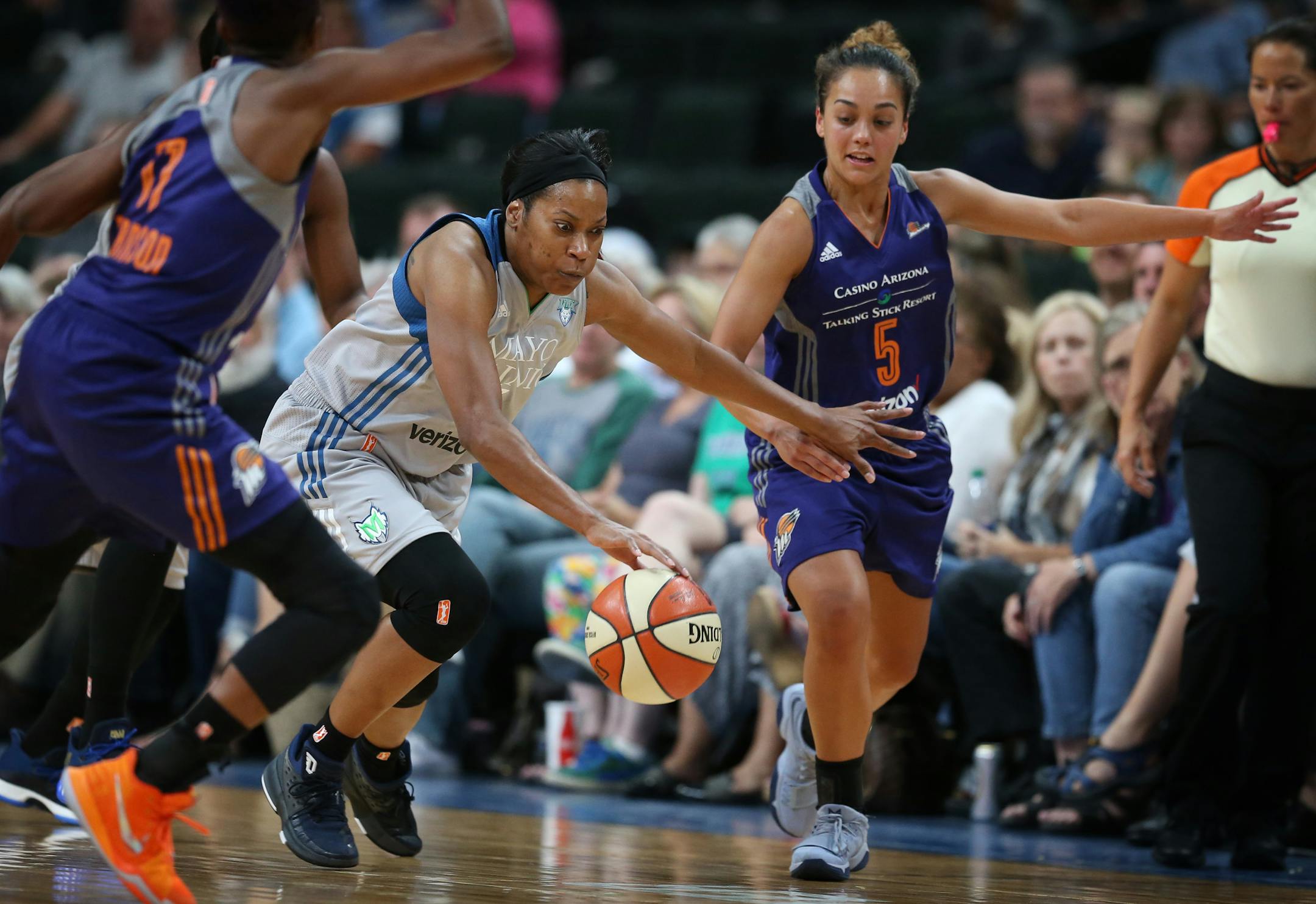 Minnesota Lynx guard Jia Perkins (7) stole the ball from Phoenix Mercury guard Leilani Mitchell (5) in the second half at Xcel Energy Center on Tuesday August 22,2017 in St. Paul, MN.