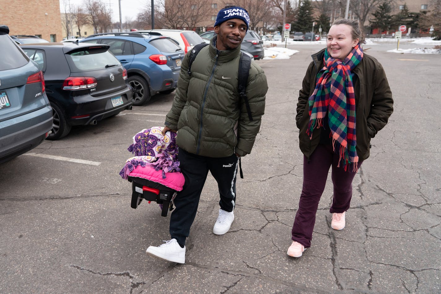 Jamal Jones and Alliyah Ross returned to Bethlehem Baptist Church after firefighters cleared an alarm that briefly forced them into the parking lot. ] MARK VANCLEAVE &#xa5; Jamal Jones and Alliyah Ross (both 20) and their five-week-old daughter Chanel have been staying at Bethlehem Baptist Church with about 100 other former Francis Drake Hotel residents since the Christmas Day fire. Photographed Friday, Dec. 27, 2019 in Minneapolis.