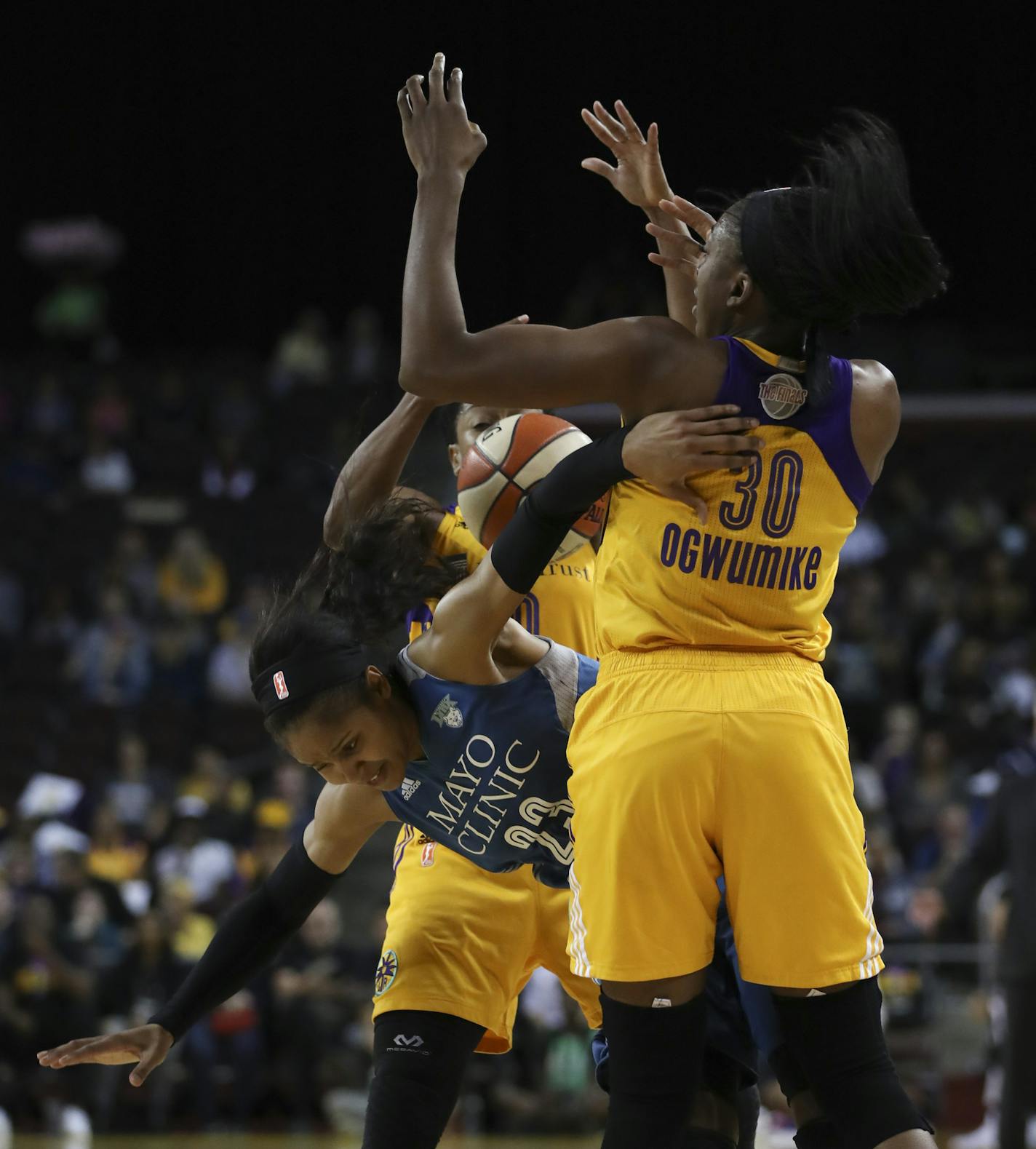 Minnesota Lynx forward Maya Moore (23) was stripped of the ball as she was defended hard by Los Angeles Sparks guard Alana Beard (0) and forward Nneka Ogwumike (30) in the second quarter. ] JEFF WHEELER &#xef; jeff.wheeler@startribune.com The Minnesota Lynx faced the Los Angeles Sparks in Game 3 of their WNBA Finals series Friday night, October 14, 2016 at the Galen Center in Los Angeles.