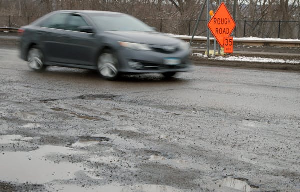 The speed limit on Shepard Road in St. Paul was reduced from 50 to 35 mph because of all its potholes.