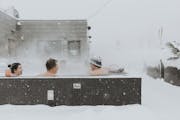 Warm up in the hot tubs on the Hewing’s rooftop.