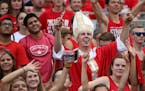 A St. John's University fan dressed as clergy cheered from the stands in the second half.