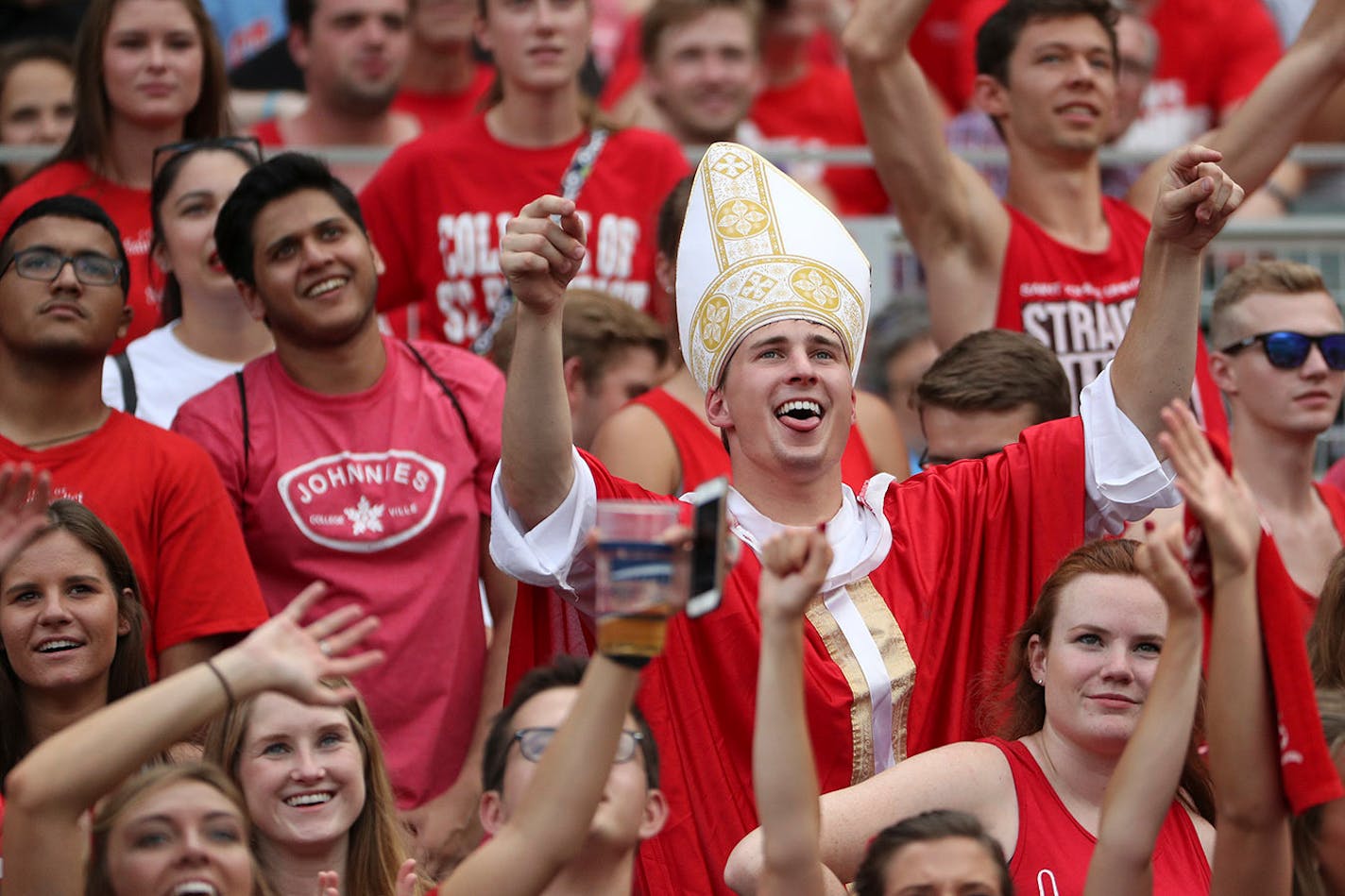 A St. John's University fan dressed as clergy cheered from the stands in the second half.