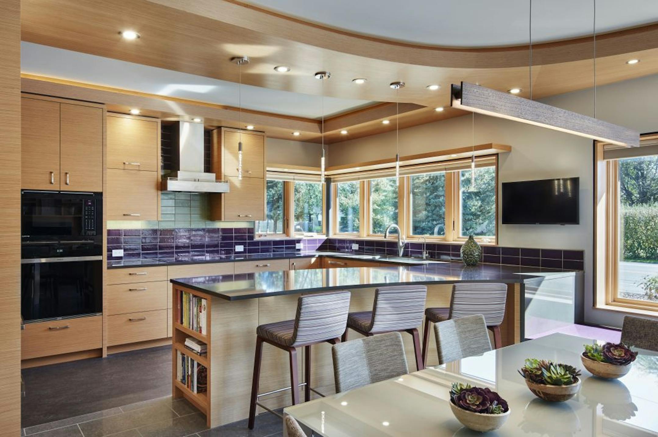 Lilu Interiors uses Ultra Violet accents in a kitchen design.