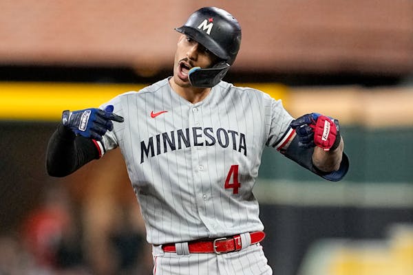 Carlos Correa celebrated after hitting a double in the first inning of Game 2, one of four times he reached base in the Twins’ 6-2 victory over the 