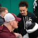 Braeden Carrington talked to fans during a basketball game at Park Center, where he was honored last week. He’s currently on leave from the Gophers 