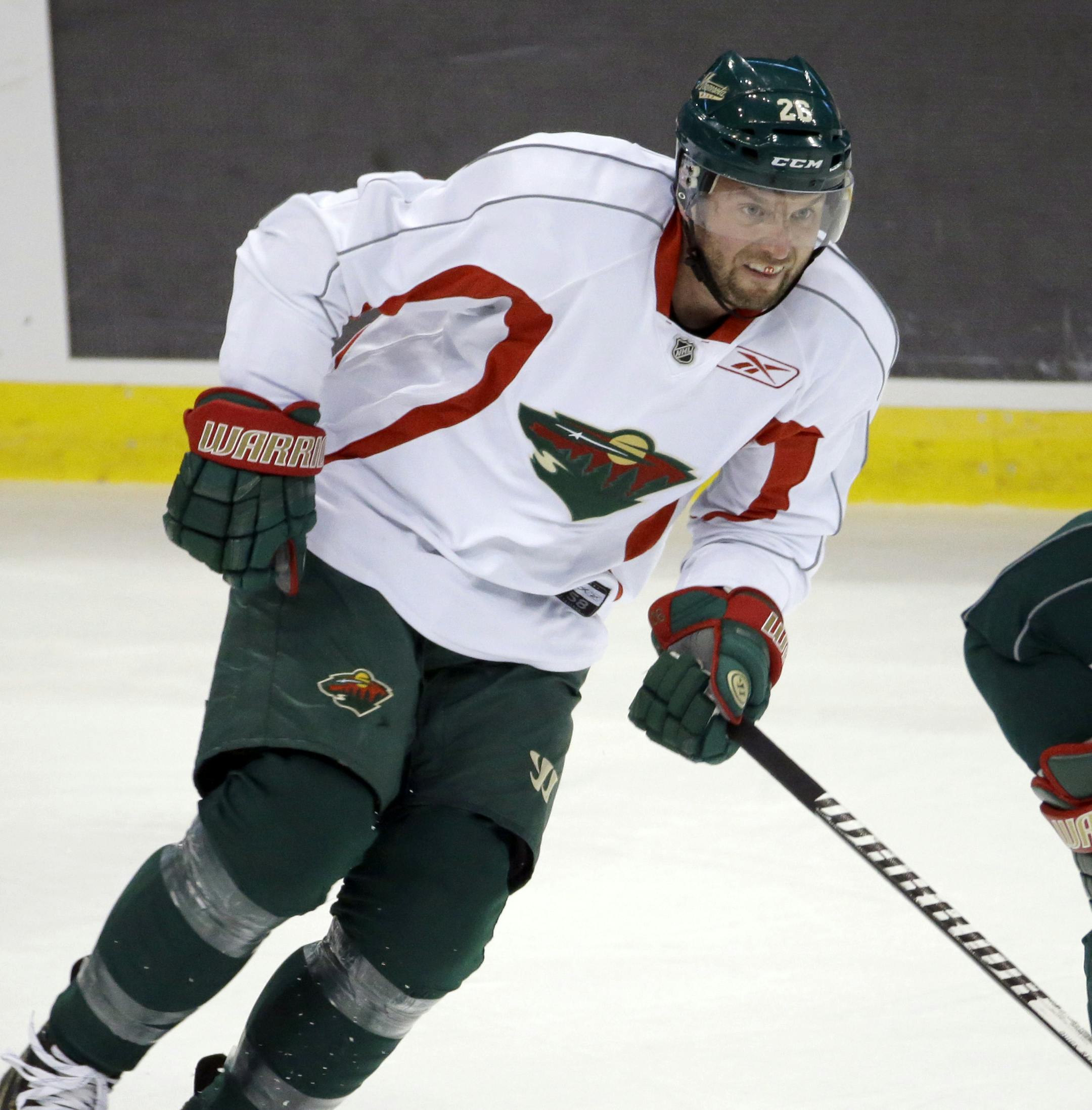 Minnesota Wild left wing Thomas Vanek takes part in a scrimmage during NHL hockey training camp in St. Paul, Minn., Friday, Sept. 19, 2014. (AP Photo/Ann Heisenfelt)