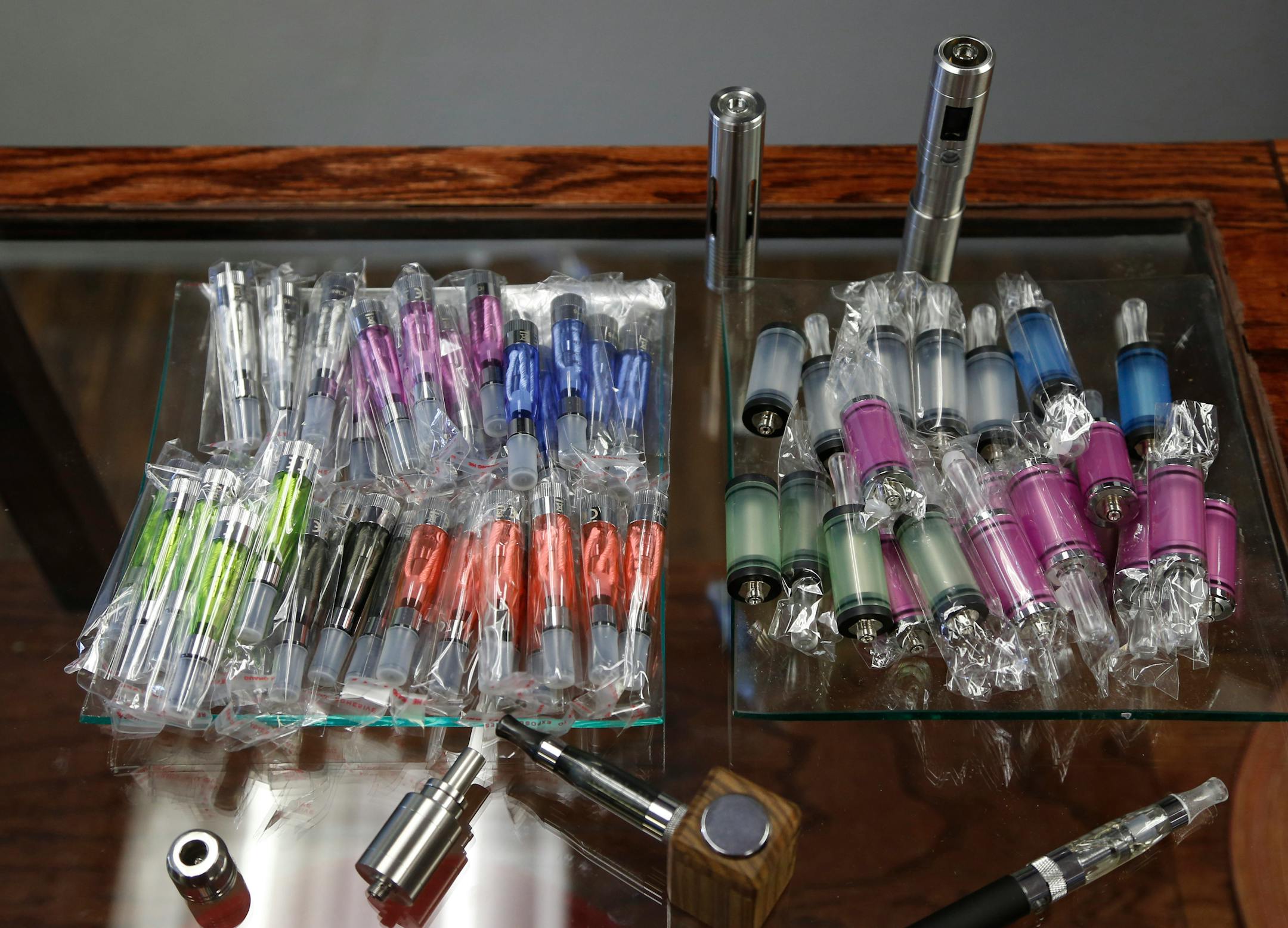 In this April 19, 2013 file photo, a sampling of electronic cigarette supplies are seen in a shop.